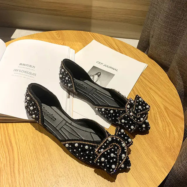 Glitter ballet flats with pointed toes and rhinestone details
